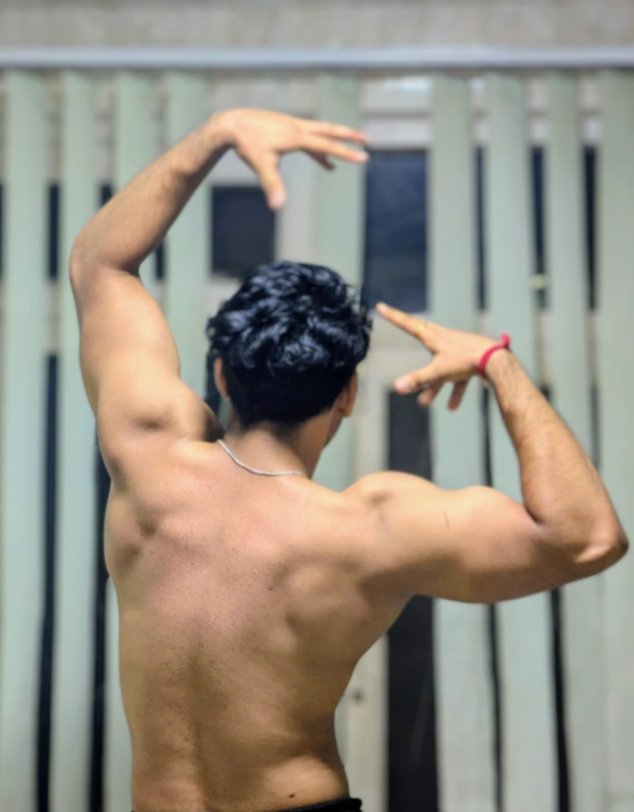 Founder in a focused, high-contrast training pose.